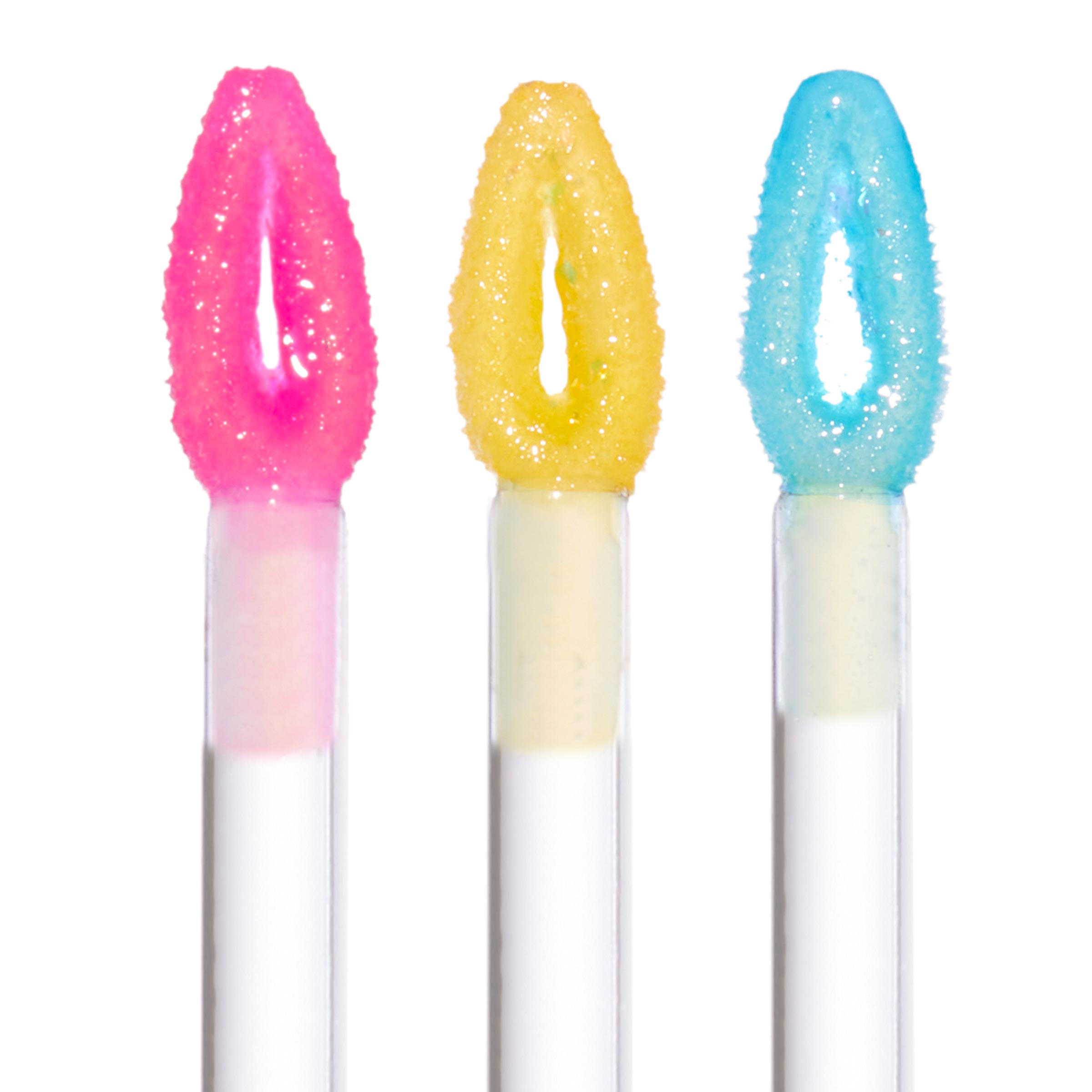 Three doe-foot wands showcase Talk To Me Ultra Glossy Lip, each tip coated in sparkly pink, yellow, and blue gloss, lined up on a white background; ColourPop Ultra Glossy Lip shows a high-shine, cushiony texture.