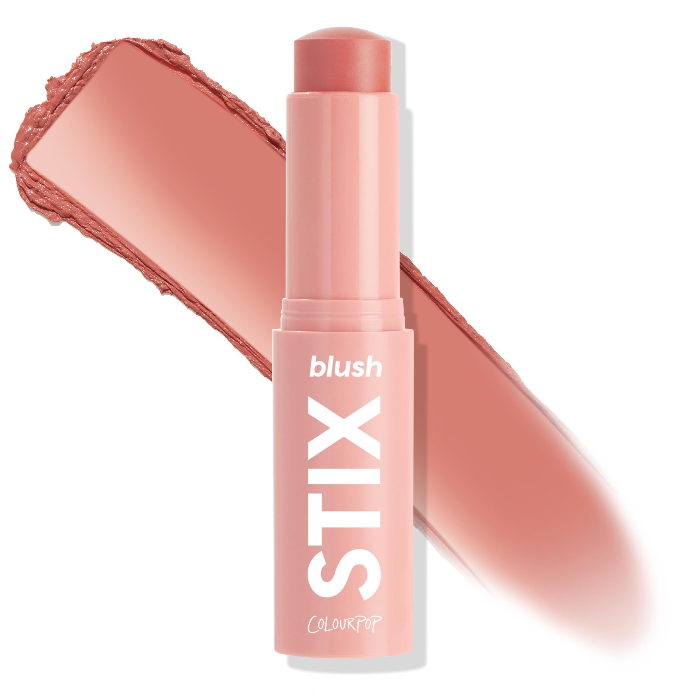 ColourPop Blush Stix in 25-Aug stands uncapped, revealing a rounded cream blush bullet, while a matching warm rosy-peach swatch sweeps behind the tube; twist-up stick with bold STIX branding on a white background.