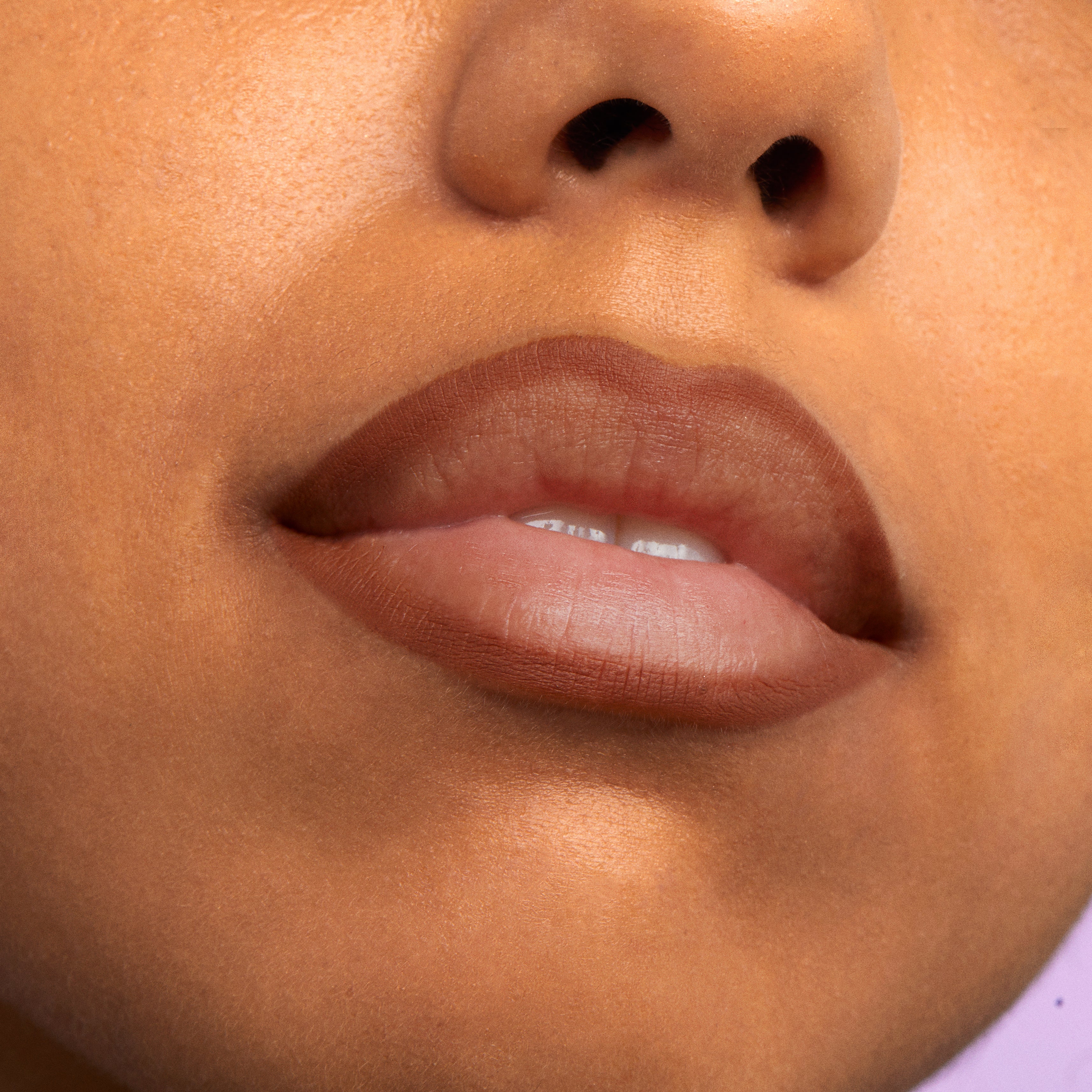 Lips softly lined and slightly filled with ColourPop Truth or Bare Lippie Pencil, a warm nude-brown, crisply defining the cupid’s bow with a smooth matte finish in a tight close-up beauty shot under soft studio lighting.