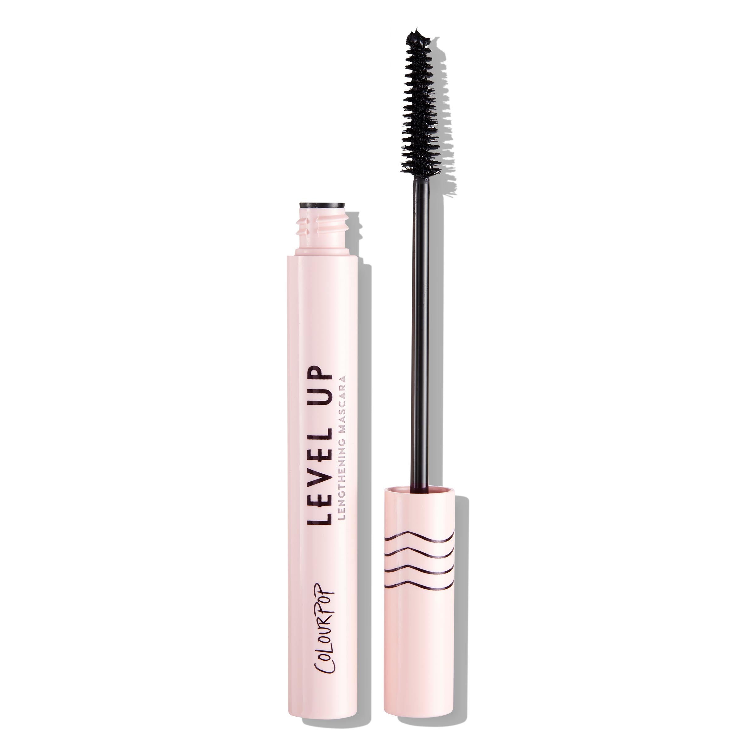 Open pale pink Level Up tube of ColourPop Lengthening Mascara in Black displays a slim, straight brush coated with black pigment, wand resting beside the cap on a white background, LEVEL UP and ColourPop logos visible for lash-lengthening.