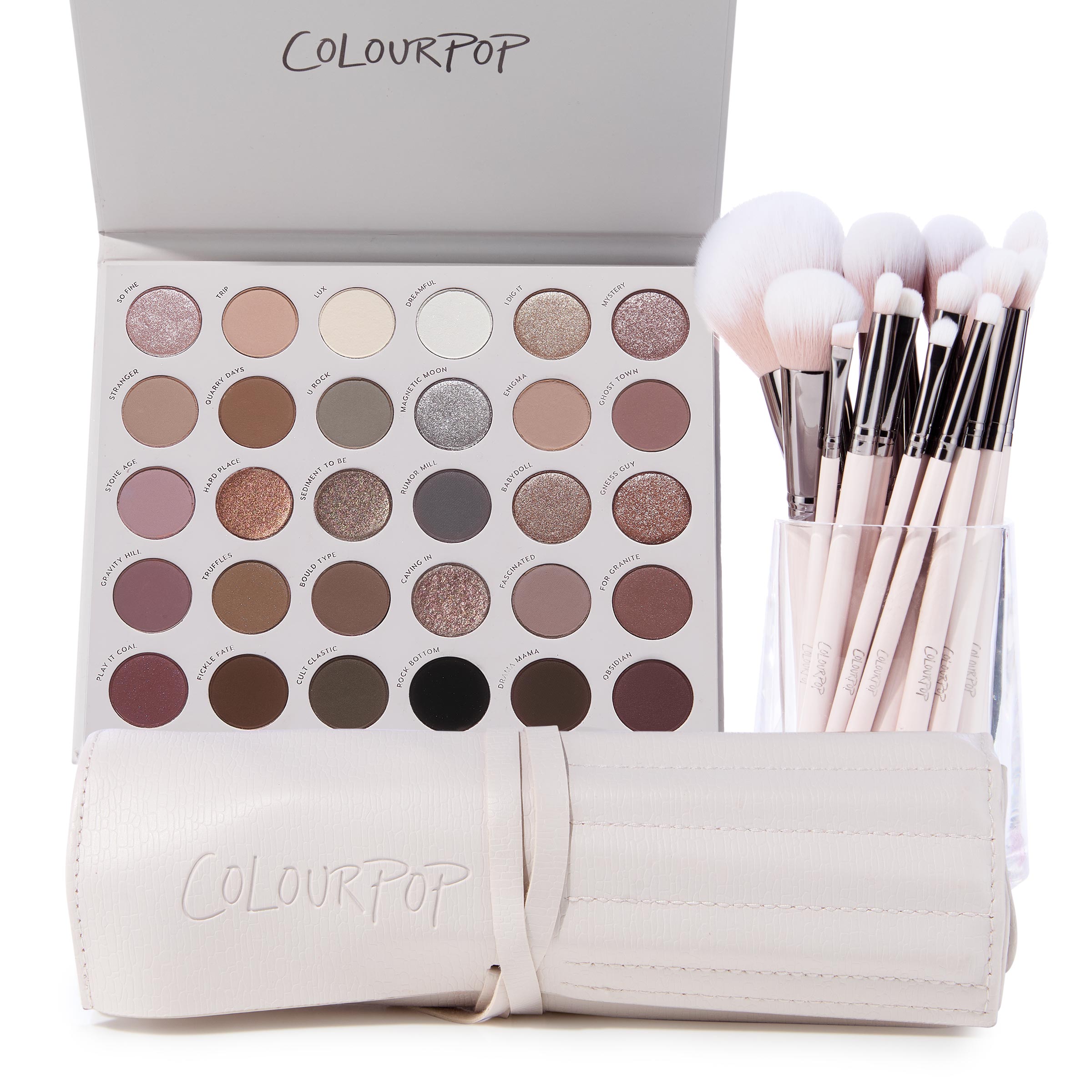 The Ultimate Stunner ColourPop Shadow Palette & Brush Set displaying an open 30‑pan neutral matte and shimmer eyeshadow palette beside pink‑handled makeup brushes in a clear cup and a cream brush roll, on a white background.