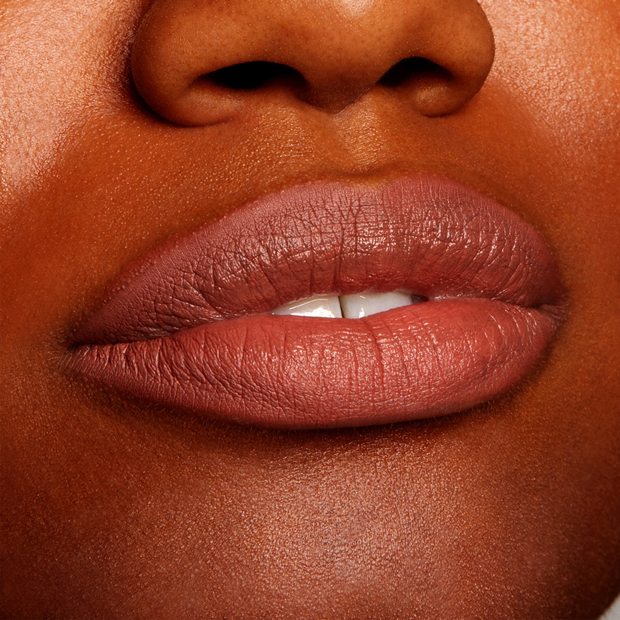 Matte-lined lips wear BFF2, a warm midtone nude brown, precisely outlining and softly filling the lips; ColourPop Lippie Pencil delivers smooth, even coverage in a tight beauty close-up.