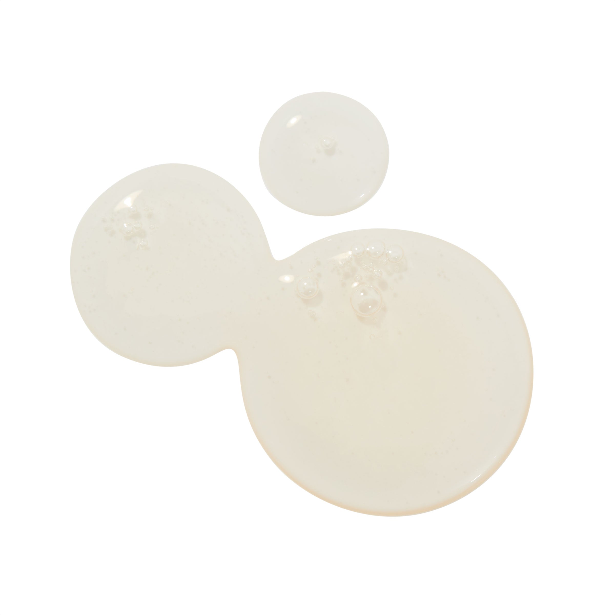 AM to the PM Gel Cleanser by ColourPop swatched as clear gel drops with micro-bubbles, pooling in three circles to show lightweight texture on a white studio background; face cleanser texture shot for product detail and SEO.