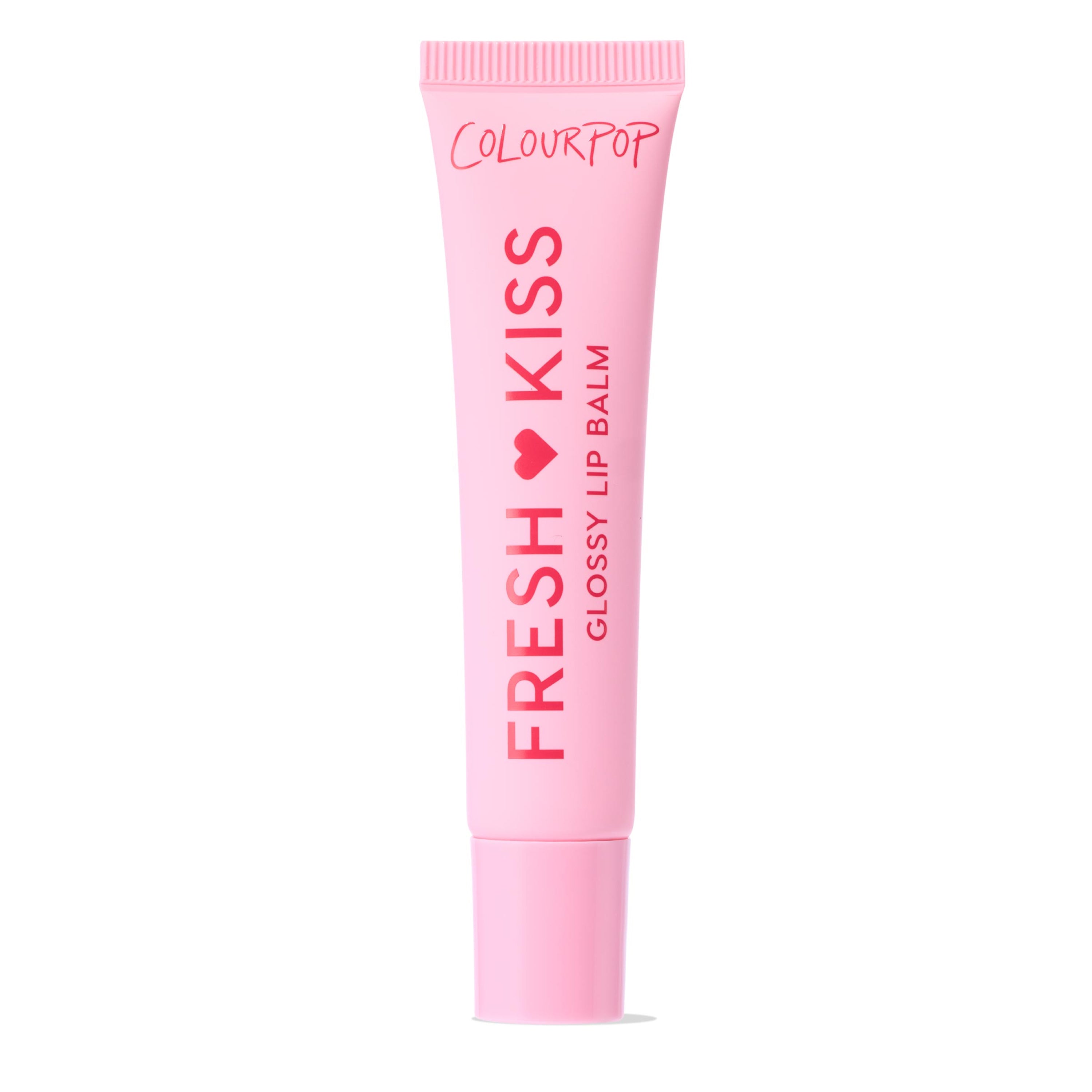 ColourPop Fresh Kiss Glossy Lip Balm standing upright on a white background, a pink squeeze tube with red lettering and heart icon, cap closed, front label reading Fresh Kiss and Glossy Lip Balm.