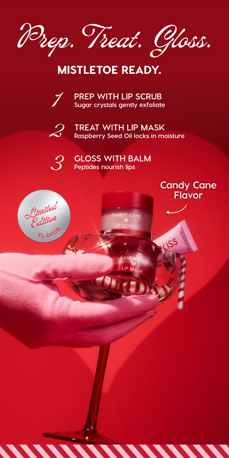 ColourPop limited-edition Candy Cane lip-care set held by a pink-gloved hand - lip scrub, lip mask, and gloss balm arranged in a coupe glass with peppermint candies - highlighting a holiday prep, treat, and gloss routine on a vivid red background.