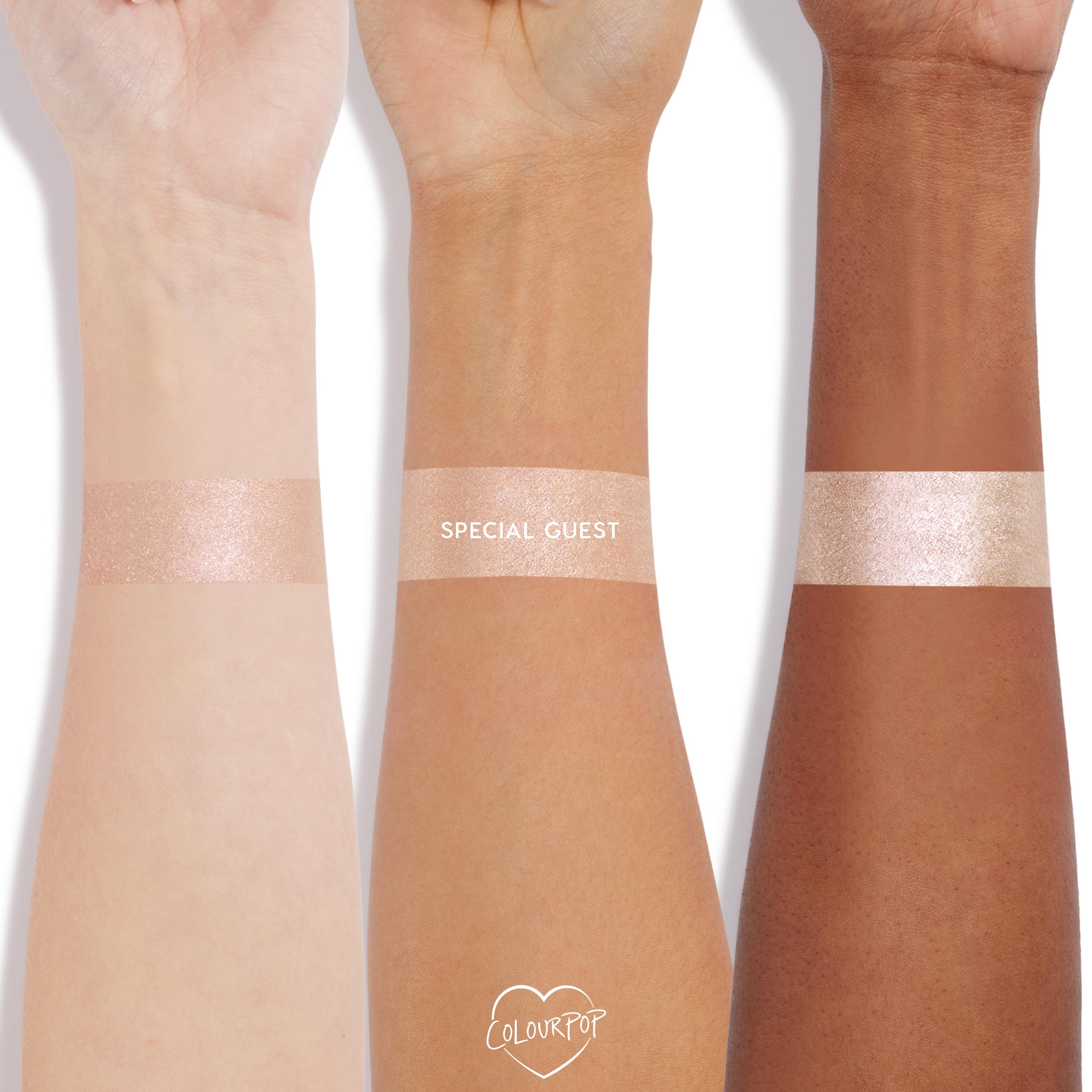 Shimmery champagne “Special Guest” highlighter swatch wraps across three arms in light, medium, and deep tones, showing payoff and sheen; part of the As Old As Time ColourPop Shadow Palette, Cheek, & Lip Set.
