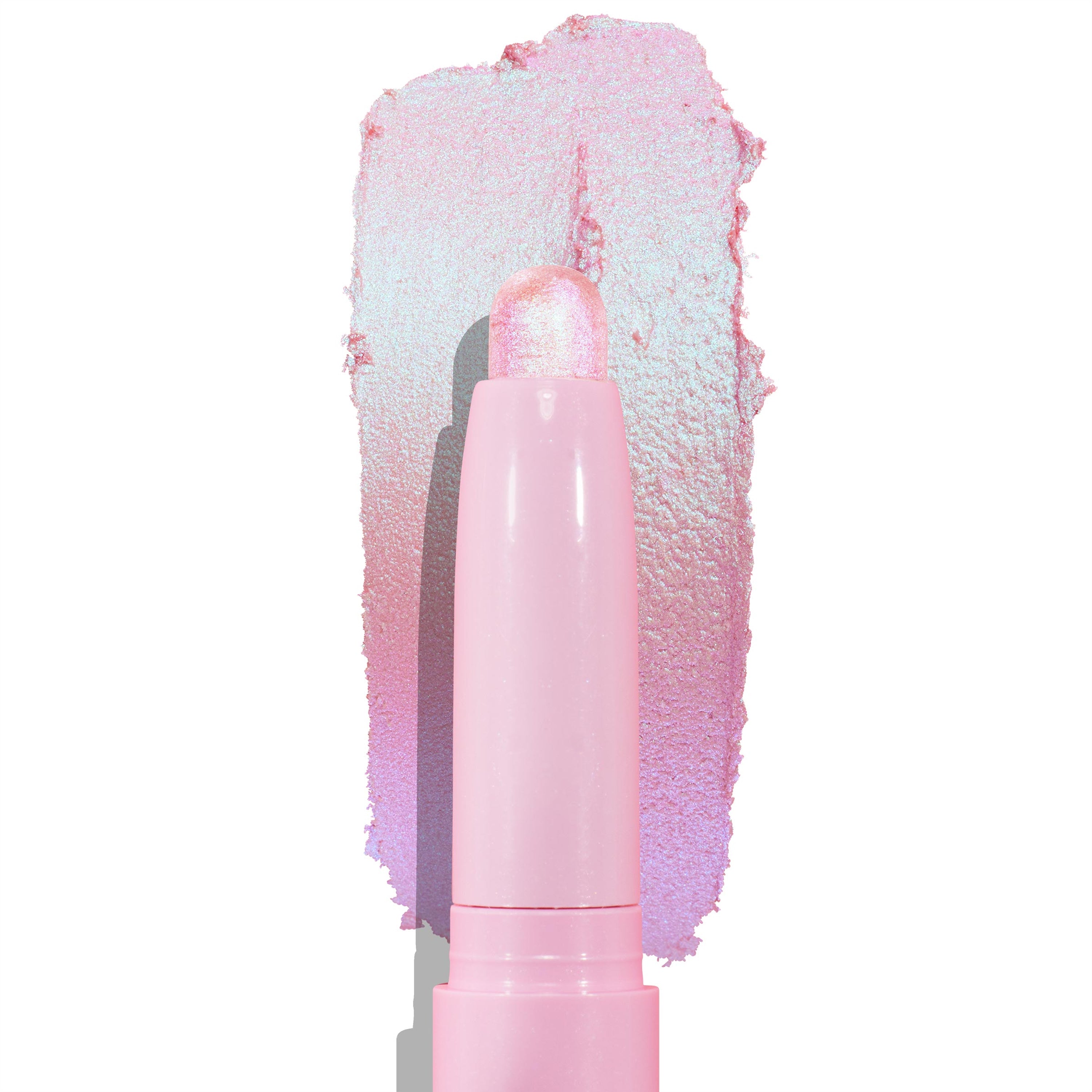 Colourpop Disco Disco Shadow Stix in a pastel pink tube gliding on iridescent pink-lilac cream eyeshadow swatched boldly on a white background, showing its shimmer and smooth, blendable texture for US makeup lovers.