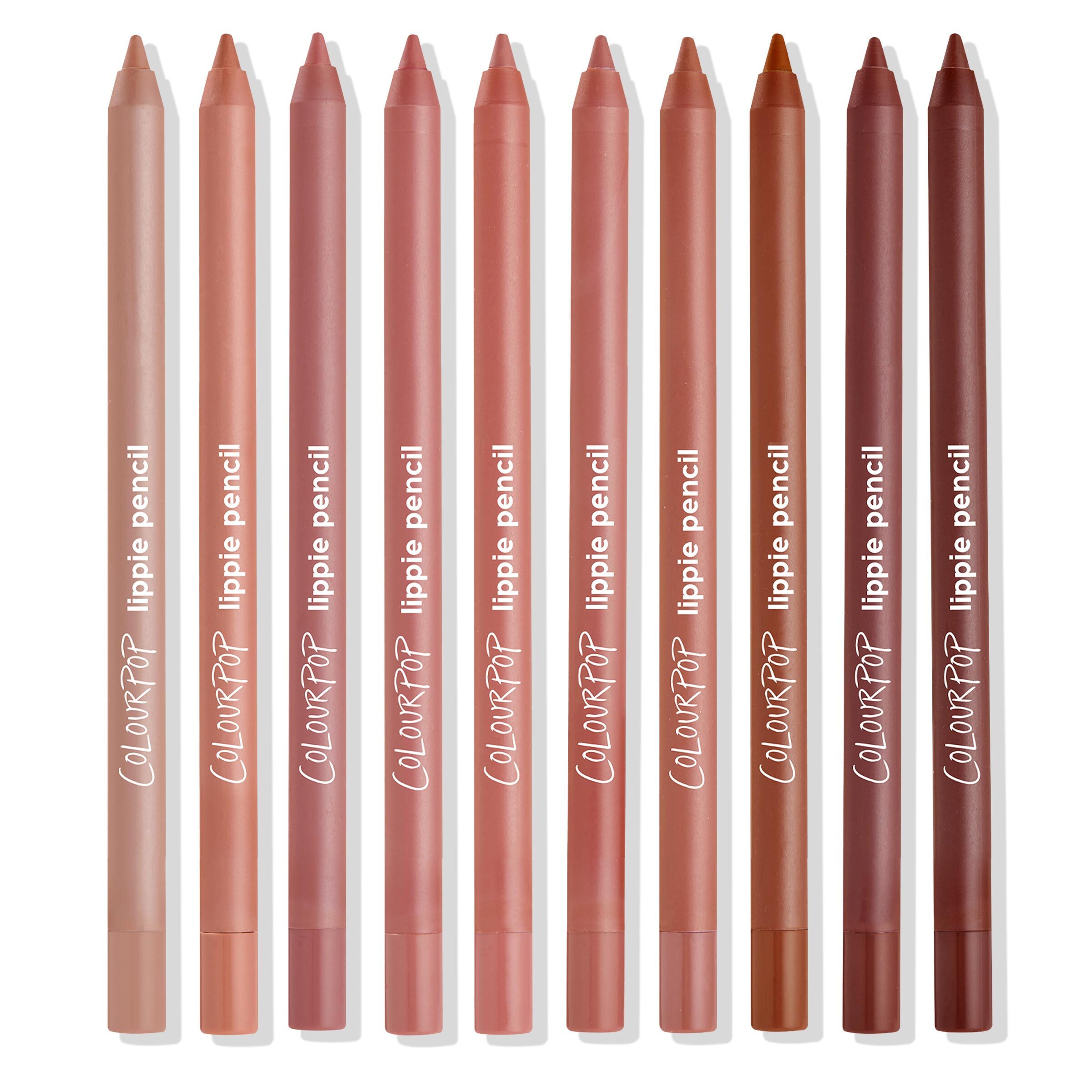 ColourPop Truth or Bare Lippie Pencil kit standing upright in a neat row, ten lip liner pencils in nude, pink, mauve, terracotta, and brown tones on a white background, with ColourPop “lippie pencil” branding visible.